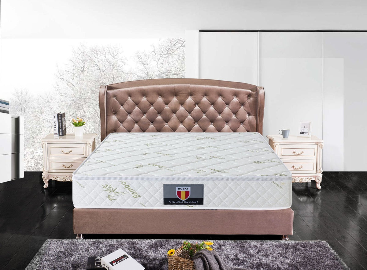 Husky Kingdom mattress in a bedroom setting, front view