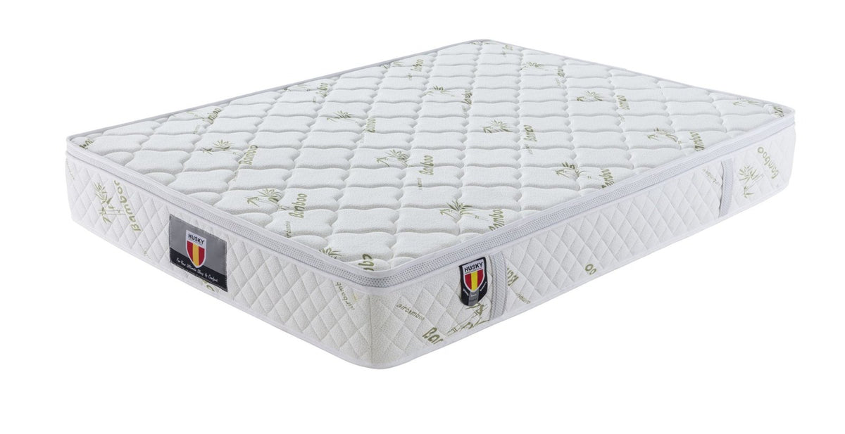 Husky Five Star Kingdom 11 inch pocket coil mattress with bamboo cover, angled view