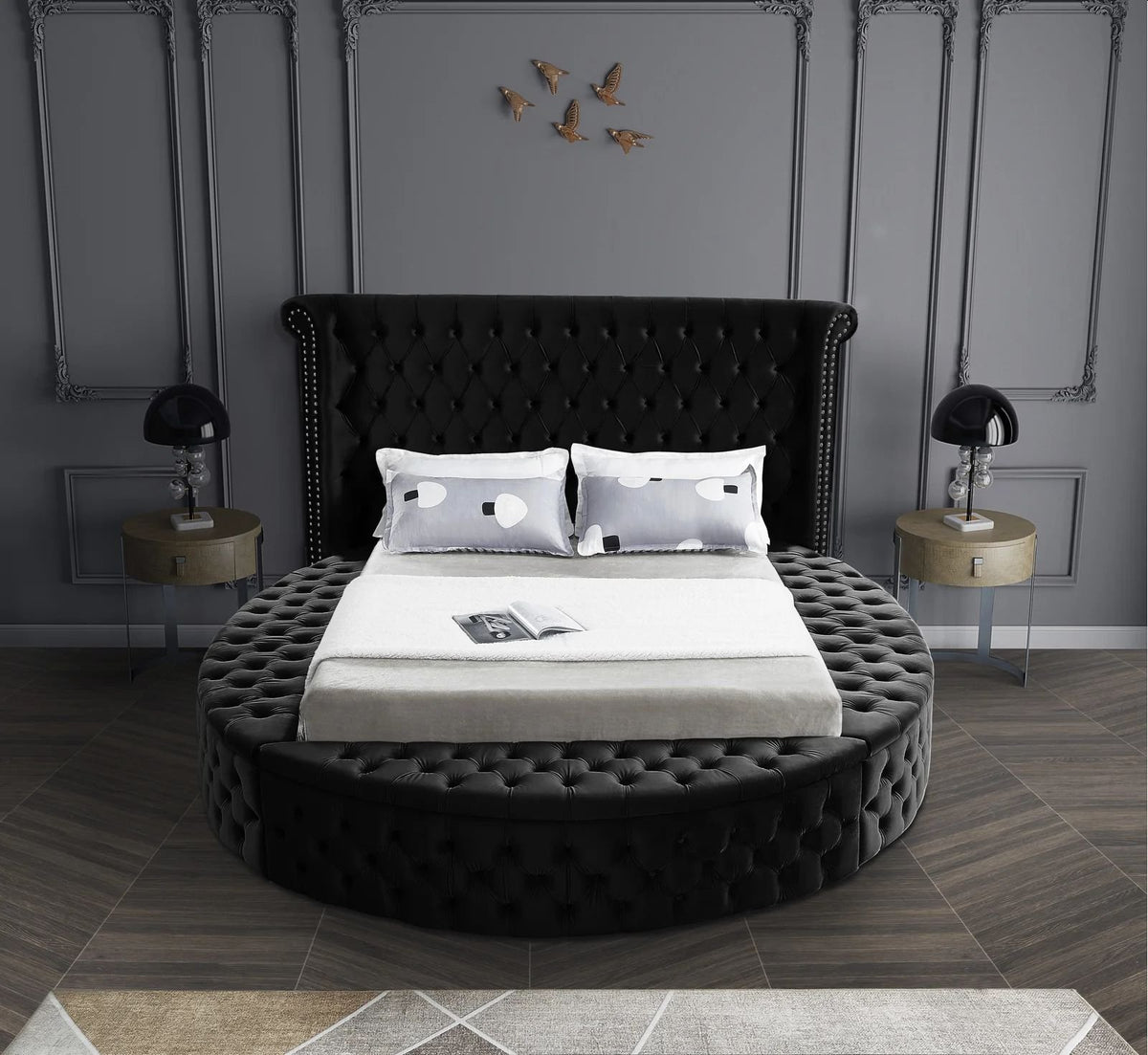 Alora round storage bed in black velvet in a bedroom