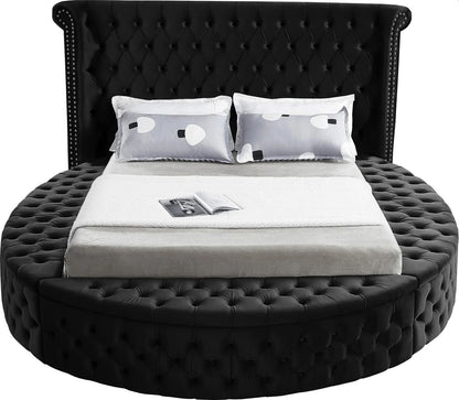 Alora round storage bed in black velvet, front view on white