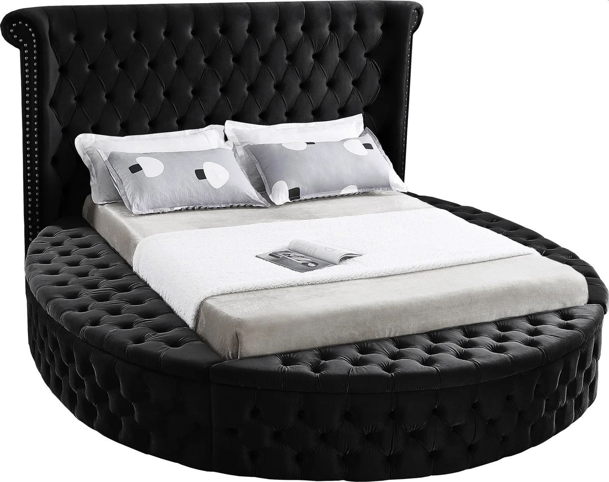 Alora round storage bed in black velvet, white background