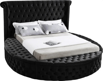 Alora round storage bed in black velvet, white background