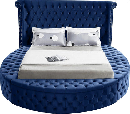 Alora round storage bed in blue velvet, front view