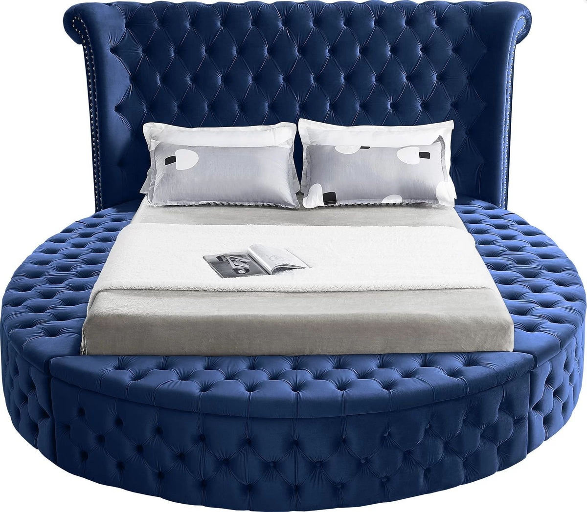 Alora round storage bed in blue velvet, front view on white