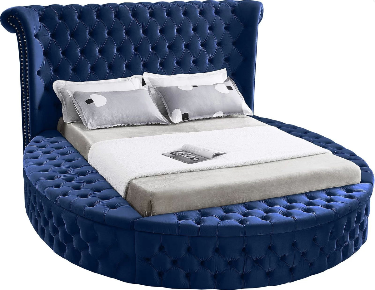 Alora round storage bed in blue velvet, side angle