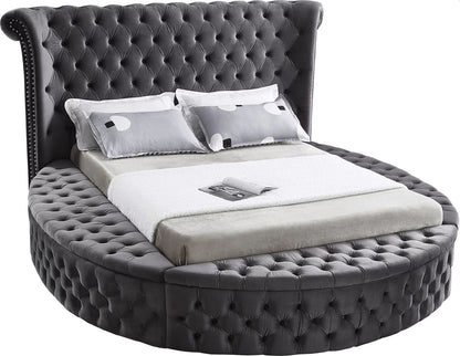 Alora round storage bed in grey velvet, white background