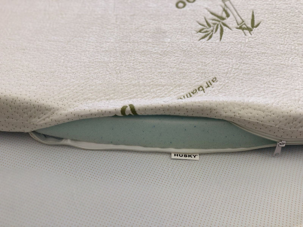 Close-up of the zippered bamboo cover opened to show the blue gel memory foam