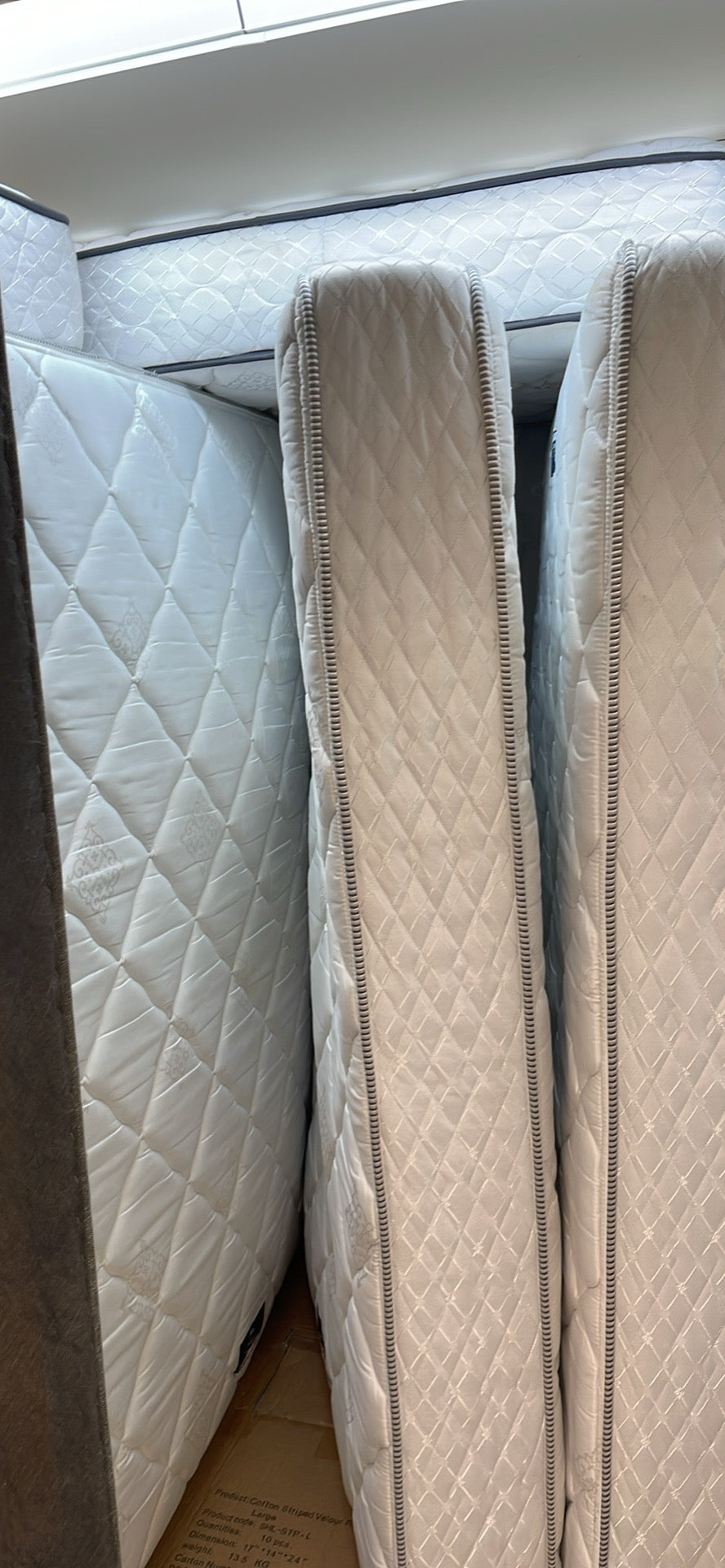Stacked quilted hotel mattresses